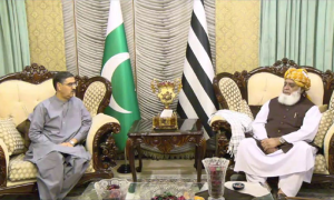 Interim PM Visits JUI-F Chief House to Condole over Death of Workers