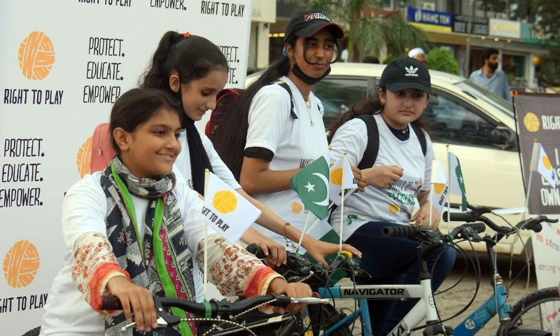 Right to Play, Azadi Cycle Rally, Pakistan, Defense Day, Islamabad, Jinnah Avenue, Armed Forces, School Girls