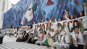 Activists Hold Solidarity Protest with Gaza During COP28