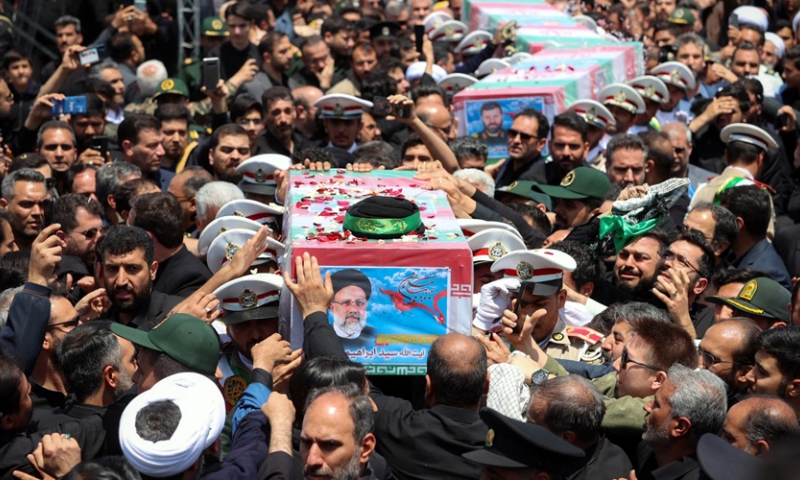 Tens of Thousands Bid Farewell to Iranian President Raisi Ahead of Burial 1