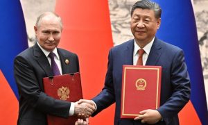Xi, Putin Emphasize China-Russia Relations as Stabilizing Force in Chaotic World