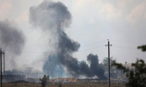 Ukrainian Drone Attack Sets Russian Munitions Depot Ablaze Near Border 1
