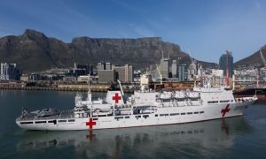 The Chinese military hospital ship, Peace Ark, has docked in Cape Town, South Africa. The floating hospital will take part in a joint exercise for humanitarian services between the two countries. It will also provide independent medical services for seven consecutive days, with a 600 - 700 outpatient capacity. CGTN's Julie Scheier reports.