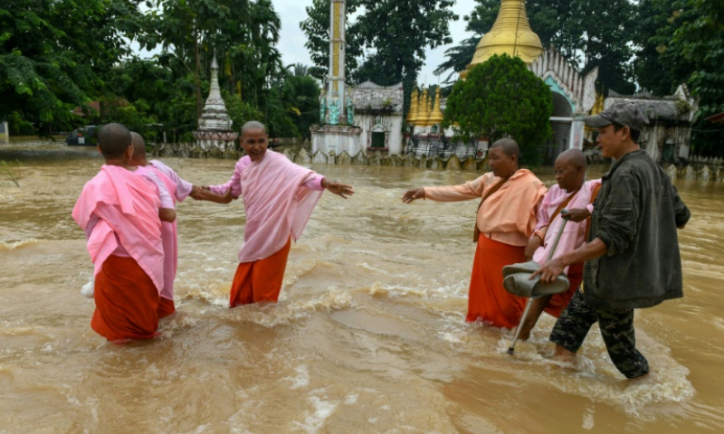 Volunteers Rush to Aid Flood Hit Myanmar as Death Toll Surges to 113